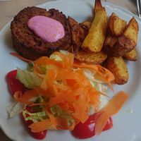 Vegan bean patty with mayo and salad at Upcycle Milano Bike Cafe in Milan