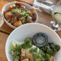 Tofu rice bowl and crispy potatoes with no aioli  at Loro in Austin