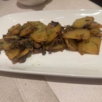 Potato with mushrooms and onions - side dish  at Joy Chaikhana Lounge  in Bukhara