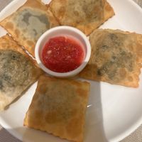 Hot appetiser with spinach filling   at Joy Chaikhana Lounge  in Bukhara