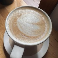 Latte with rose pistachio latte with oatmilk   at UP Coffee Roasters  in Minneapolis