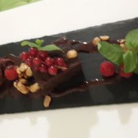 Chocolate Brownie with peanuts and icecream at The Green Garden in Salzburg