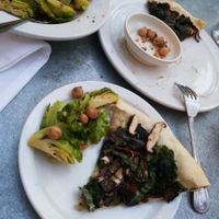 Mushroom pizza and brussel sprouts made vegan at Restaurant 415 in Fort Collins
