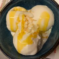 Vegan Coconut ice cream with passion fruit sauce  at Wagamama - Union Square in Aberdeen