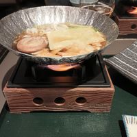 The third course: onabe (vegetables, yuba, and mochi that you cook in broth over a flame). This is after I had put the vegetables in the broth. at The Dining - Shiba Park Hotel in Tokyo