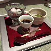 Zenzai, a traditional Japanese dessert: sweet red beans with mochi. To the right, warabi mochi with kuromitsu syrup. at The Dining - Shiba Park Hotel in Tokyo