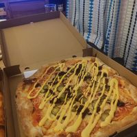 Pickle pizza at Dough and Bones in Stockport