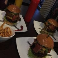 Two fidel castros, one john f kennedy, two bowls of curly fries  at Lily Burger in Berlin