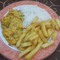 Spicy vegetable korma, chips and boiled rice at Sabor da India in Funchal