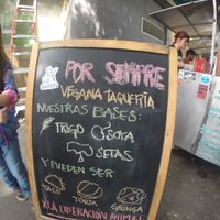 Translation:
Our foundation ingredients: 
Wheat, Soya, Mushrooms
You can have it:
Tacos, Tortas, Gringas at Por Siempre Vegana - Food Stall in Mexico City