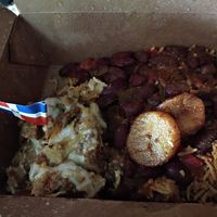 Pastelon, Moro de guandales, kidney beans and plantains at Dominican Garden Cafe in Johnstown