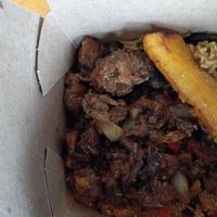 "Steak" tips with rice and black beans at Dominican Garden Cafe in Johnstown