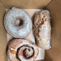Top left vanilla donut, bottom left cinnamon roll, and right buttermilk bar at Level 5 Donuts in Madison