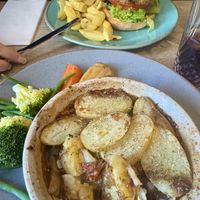 Aubergine and black bean burger with house chips and Parmentier pie with steamed green veg and roasted carrot and parsnip  at The Lazy Trout  in Leek