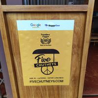 Sign at Five Chutneys - Mambo Cafe in Karatu