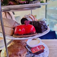 Some mini sandwiches, pastries, and scones ✨️ at La Roche in London