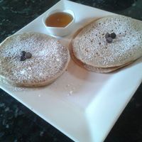 Vegan pancakes with dark chocolate chips and maple syrup at Dodo Bon Pan Cafe in Panama City