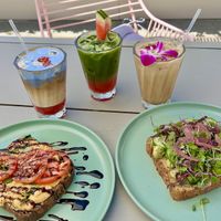 Hummus toast and avocado toast with pickled onions. July 4th specials (water melon matcha and strawberry and cream latte) and the Kauai.   at 1 Oz Coffee  in Santa Clara