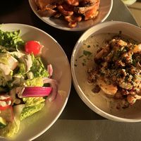 Israeli salad (give this a miss), crispy potato skins (sauce is not vegan but I dipped them in the cauliflower sauce!), fried cauliflower (a MUST!)  at NENI - Mallorca Es Trenc in Mallorca