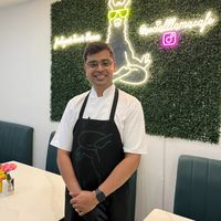 Chef Ishan working his magic at Social Llama.  Stop by for the food and stay to chat with the chef! at Social Llama Cafe in Toronto