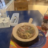 Vegan noodle plant based meat clay pot at SEE FAH Restaurant in Bangkok