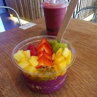 Pink Pitaya Bowl: Granola, strawberry, mango, pineapple, kiwi, raspberry, passionfruit, agave at The Plant Boost in Wilmslow