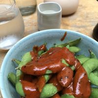 Edamame with spicy sauce.  at Feng Sushi - Borough Market in South East London