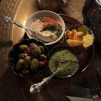 vegan dips (hummus and green tahini, the muhammara dip has honey) and veggies  at Leila in San Diego