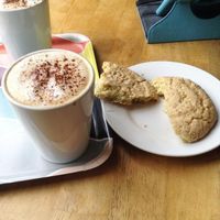 Almond milk cappuccino and vegan cookies at Art Cafe in Oxford