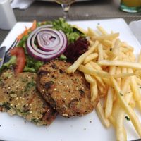 Vegan burger patties with salad and fries at Reis Magos Restaurant - Maybe closed in Canico