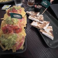Nachos with cheese, guacamole & salsa. Black bean & cheese enchiladas   at Las Iguanas - Center Parcs Elveden in Brandon