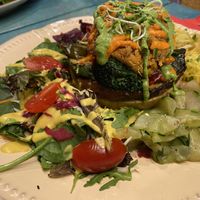 Stuffed squash and chickpea burger vegan dish at House of Wonders in Cascais