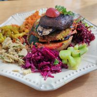 Vegan Burger with garden salad at House of Wonders in Cascais