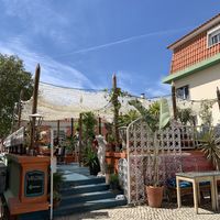 Garden seating area  at House of Wonders in Cascais