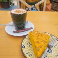 Carrot and orange cake 5€ plus cappuccino 2,5€ at House of Wonders in Cascais