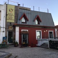 Rooftop for drinks or around the corner downstairs for a meal at House of Wonders in Cascais