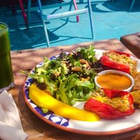 mezze plate with spinach juice at House of Wonders in Cascais