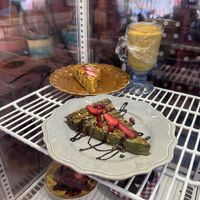 Mango cheesecake in the back  at House of Wonders in Cascais