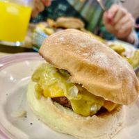 Vegan cheeseburger with beyond, vegan cheddar, vegan mayo, sweet onion, pickles, ketchup and mustard at Baka Vieja Burger Shop in Gijon