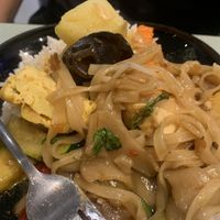 Red curry with rice mixed in a bowl with pad Thai…yum  at YOD in Haymarket