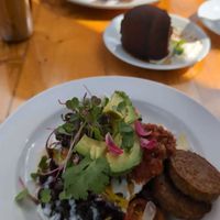 Rancheros with side of sausage at Vegetate  in Kapaa
