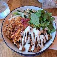 Rice bowl with filling fried oyster mushrooms at Bar Bao in Leuven