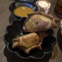 Fire baked empanadas, fermented tomato chimichurri rojo  at Smith & Daughters in Collingwood