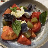 Simple tomato salad using locally sourced stuff, topped with house ricotta.  at Smith & Daughters in Collingwood