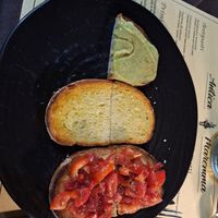 Veganised crostini (like bruschetta) at Trattoria Antica Maremma in Ferrara