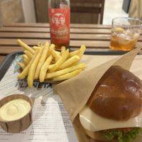 Khambu Burger with fries and sweet mustard mayo. Served with Fritz Spritz rhubarb.   at Khambú - Ruzafa in Valencia