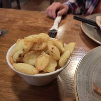 Fried sliced potatoes with garlic oil at Rosato's Bar & Restaurant in Moville