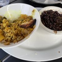 Curry tofu burrito bowl with a side of black beans  at Black Sheep Burrito and Brews in Huntington