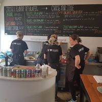 Menu and friendly staff at We Love Falafel in Brighton