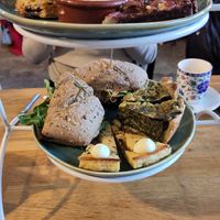 Afternoon tea, bottom layer: sandwich, quiche and spinach pie at Koffie ende Koeck in Amsterdam